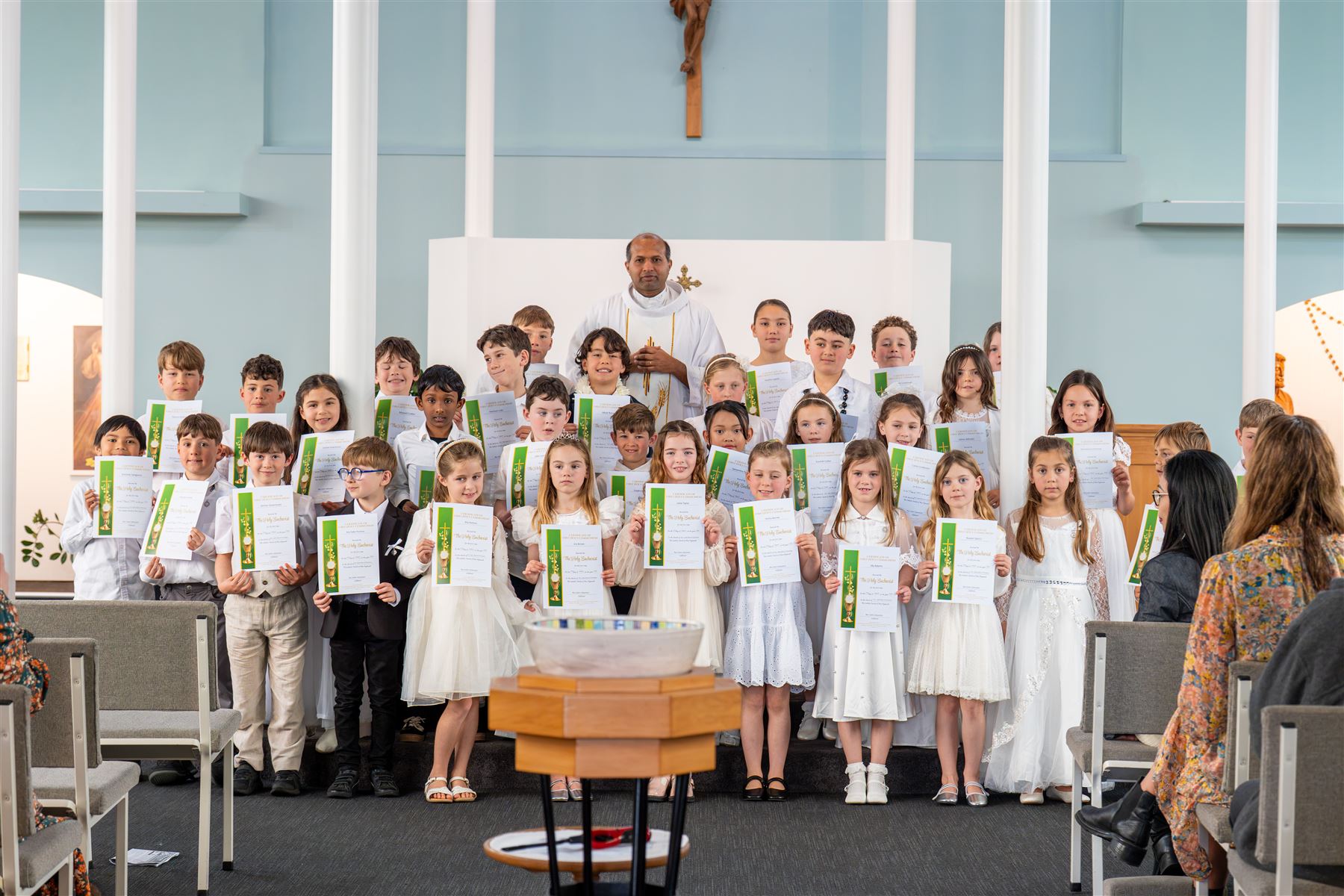 First Holy Communion group with certificates