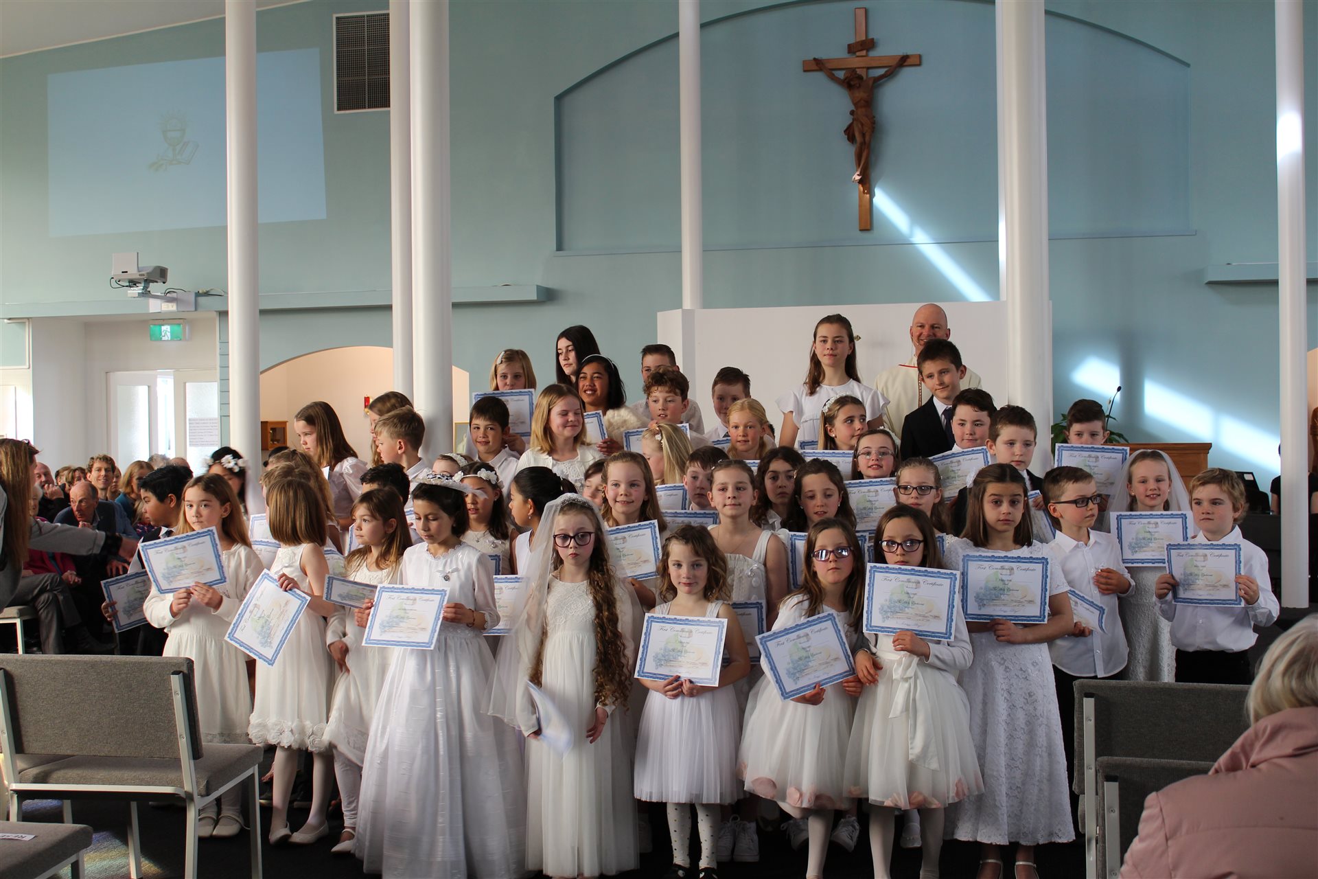 Holy Communion being shared during Mass at the parish